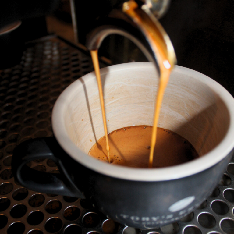 Coffee being poured at the pass
